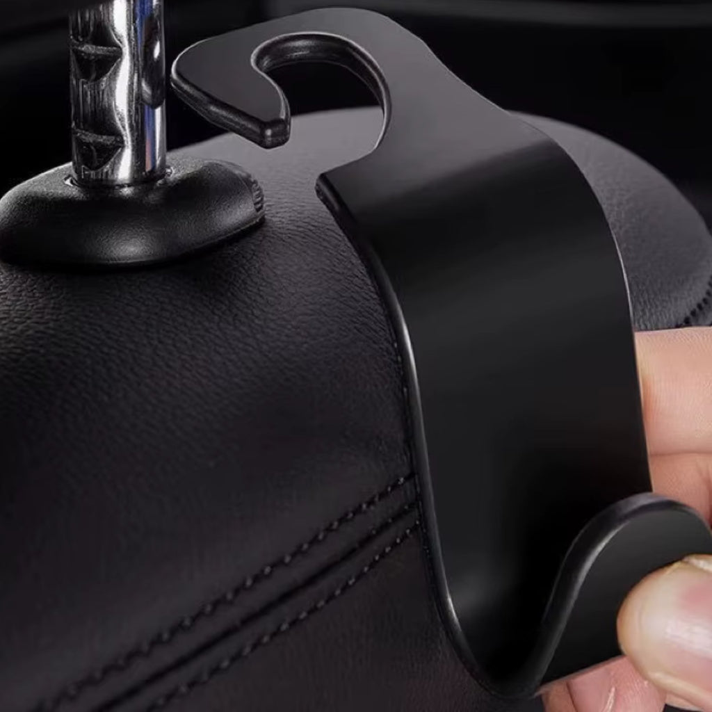 Clipping a hook onto a headrest post