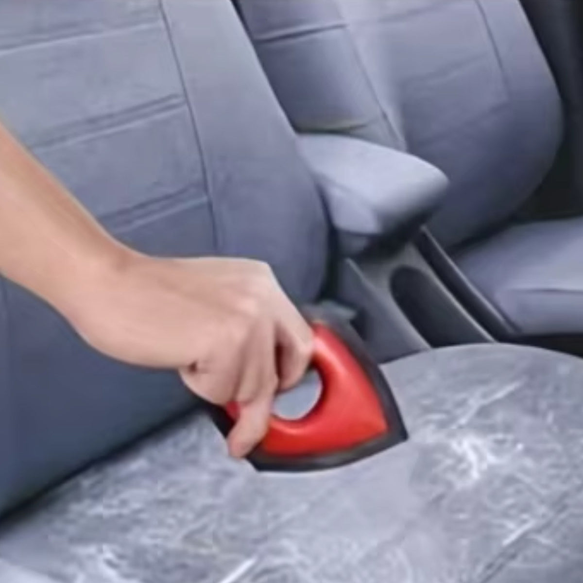 Pulling dog hair out of a car seat